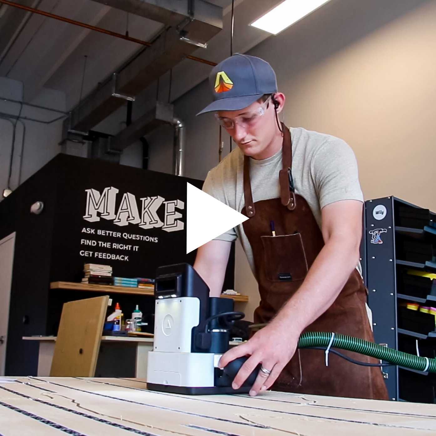 Preview thumbnail of the featured video - a man uses a handheld cnc